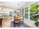 Bright breakfast nook with large windows and views of the backyard at 1414 Park Dr, Raleigh, NC 27605