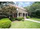 Charming two-story brick home with white columns and manicured landscaping at 1414 Park Dr, Raleigh, NC 27605
