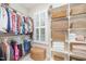 Organized walk-in closet with custom shelving, storage baskets, and natural light at 1414 Park Dr, Raleigh, NC 27605