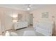 Cozy Bedroom with white furnishings, soft lighting, and ample storage at 1523 Oak Forest Dr, Hillsborough, NC 27278