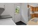 Bright eat-in kitchen with stainless steel appliances and view to backyard at 1523 Oak Forest Dr, Hillsborough, NC 27278