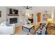 Bright and airy living room featuring a fireplace, hardwood floors, and an open layout at 1523 Oak Forest Dr, Hillsborough, NC 27278