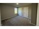 Cozy bedroom with two large closets and a window at 154 Oakfield Trace Dr, Four Oaks, NC 27524