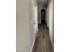 Hallway with neutral paint and modern flooring at 154 Oakfield Trace Dr, Four Oaks, NC 27524