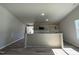 Modern kitchen featuring granite countertops, stylish cabinets, and an open layout for easy entertaining at 154 Oakfield Trace Dr, Four Oaks, NC 27524