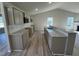 Modern kitchen featuring granite countertops, stylish cabinets, and an open layout for easy entertaining at 154 Oakfield Trace Dr, Four Oaks, NC 27524
