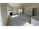 Bright living room featuring high ceilings, a cozy fireplace, and neutral walls for a modern aesthetic at 154 Oakfield Trace Dr, Four Oaks, NC 27524