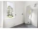 This laundry room features slate tile, a bright window, and ample space at 16 Cedar Hill Dr, Durham, NC 27713