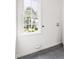 The laundry room features a slate tile floor and a bright window view at 16 Cedar Hill Dr, Durham, NC 27713