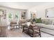 Bright and airy living room with built-in shelving and comfortable, modern furniture at 16 Cedar Hill Dr, Durham, NC 27713