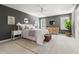Comfortable main bedroom featuring neutral tones, ample natural light, and stylish decor at 16 Cedar Hill Dr, Durham, NC 27713