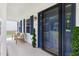 Inviting front porch with seating area and stylish blue door, enhancing curb appeal at 16 Cedar Hill Dr, Durham, NC 27713