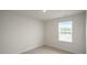Comfortable bedroom with a window offering natural light and a cozy atmosphere at 185 Carriedelle Ln, Wilson's Mills, NC 27577