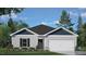 Charming single-story home featuring a two-car garage, well-maintained lawn, and inviting curb appeal at 185 Carriedelle Ln, Wilson's Mills, NC 27577