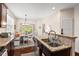 Well-designed kitchen with a breakfast nook, modern appliances, granite countertops, and ample storage at 1924 Rustica Dr, Durham, NC 27713