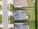 Aerial view of a home with a landscaped yard and driveway in a suburban neighborhood at 20 Sweet Birch Row, Youngsville, NC 27596