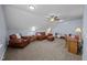 Spacious bonus room featuring carpet, cozy seating area, and a built-in desk at 20 Sweet Birch Row, Youngsville, NC 27596