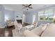 Living room with a fireplace, comfortable seating, and a neutral color scheme at 20 Sweet Birch Row, Youngsville, NC 27596