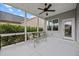 Relaxing screened porch with fan, offering a serene outdoor living space at 20 Sweet Birch Row, Youngsville, NC 27596