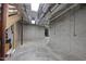 Unfinished basement with concrete floors and walls provides ample space for storage and customization at 213 Chimeneas Pl, Chapel Hill, NC 27517