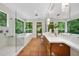 Bright bathroom featuring a walk in shower, soaking tub, double vanity and lots of natural light at 213 Chimeneas Pl, Chapel Hill, NC 27517
