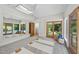 Spacious exercise room with a wall mirror, and backyard view, perfect for yoga at 213 Chimeneas Pl, Chapel Hill, NC 27517