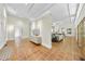 Spacious foyer featuring neutral walls, modern lighting, and tile flooring that flows into the living room at 213 Chimeneas Pl, Chapel Hill, NC 27517