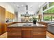 Spacious kitchen featuring granite countertops, stainless steel appliances, and ample cabinet space at 213 Chimeneas Pl, Chapel Hill, NC 27517