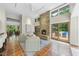 Spacious living room with fireplace and views of the backyard at 213 Chimeneas Pl, Chapel Hill, NC 27517