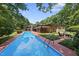 View of the pool and backyard of this well-maintained home at 213 Chimeneas Pl, Chapel Hill, NC 27517