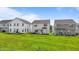 Wide shot of backyards of multiple houses with green grass at 2177 Campbell, Burlington, NC 27215