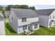 View of the home's backyard featuring a small patio and outdoor seating area at 2177 Campbell, Burlington, NC 27215