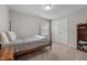 Bedroom with beige carpet, white walls, and a four-poster bed at 2177 Campbell, Burlington, NC 27215