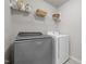 Laundry room featuring a Whirlpool washer and dryer with shelving at 2177 Campbell, Burlington, NC 27215