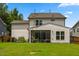 Charming home exterior with large yard and screened porch perfect for enjoying the outdoors at 2713 Jazzy St, New Hill, NC 27562