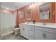Elegant bathroom featuring double sink vanity and a shower-tub with decorative curtain at 2713 Jazzy St, New Hill, NC 27562