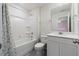 Clean bathroom featuring a shower-tub combination and modern vanity with sink at 2713 Jazzy St, New Hill, NC 27562