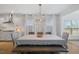 Stylish dining room with contemporary chandelier and ample natural light at 2713 Jazzy St, New Hill, NC 27562