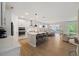 Spacious open-concept kitchen with modern appliances, a large island, and hardwood floors at 2713 Jazzy St, New Hill, NC 27562