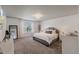 Serene main bedroom with stylish decor, comfortable bed, and large windows at 2713 Jazzy St, New Hill, NC 27562