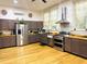 Bright kitchen featuring stainless steel appliances and ample counter space at 275 Gholson Ave, Henderson, NC 27536