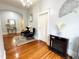 Cozy living room with hardwood floors and fireplace at 275 Gholson Ave, Henderson, NC 27536