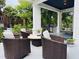 Cozy outdoor seating area on the porch, perfect for relaxing and entertaining at 275 Gholson Ave, Henderson, NC 27536
