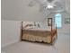 Attic bedroom features a ceiling fan and a window for natural light at 300 Williamston Ridge Dr, Youngsville, NC 27596