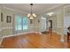 Formal dining room with hardwood floors and view to entryway and living room at 300 Williamston Ridge Dr, Youngsville, NC 27596