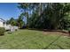 Picturesque backyard with healthy lawn and trees for privacy at 3045 Creek Moss Ave, Wake Forest, NC 27587