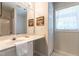 Bright, clean bathroom with a large mirror and vanity at 3045 Creek Moss Ave, Wake Forest, NC 27587