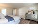 Bedroom featuring a bed, neutral paint, light window and matching dresser at 3045 Creek Moss Ave, Wake Forest, NC 27587