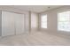 Neutral bedroom with carpet, closet, and windows at 3045 Creek Moss Ave, Wake Forest, NC 27587