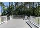Spacious deck area with railings offering privacy and outdoor enjoyment at 3045 Creek Moss Ave, Wake Forest, NC 27587